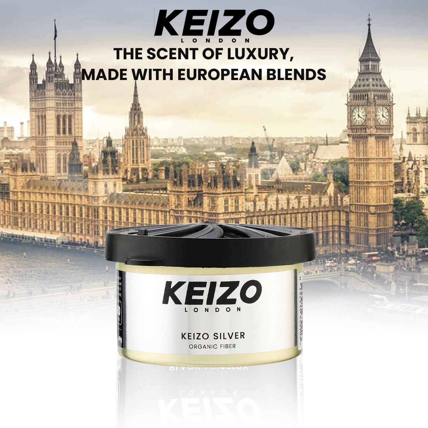 A Keizo London Silver 40g Car Perfume stands before Big Ben and the Houses of Parliament, captioned: “KEIZO LONDON. THE SCENT OF LUXURY, MADE WITH EUROPEAN BLENDS.” Experience modern luxury with Keizo.