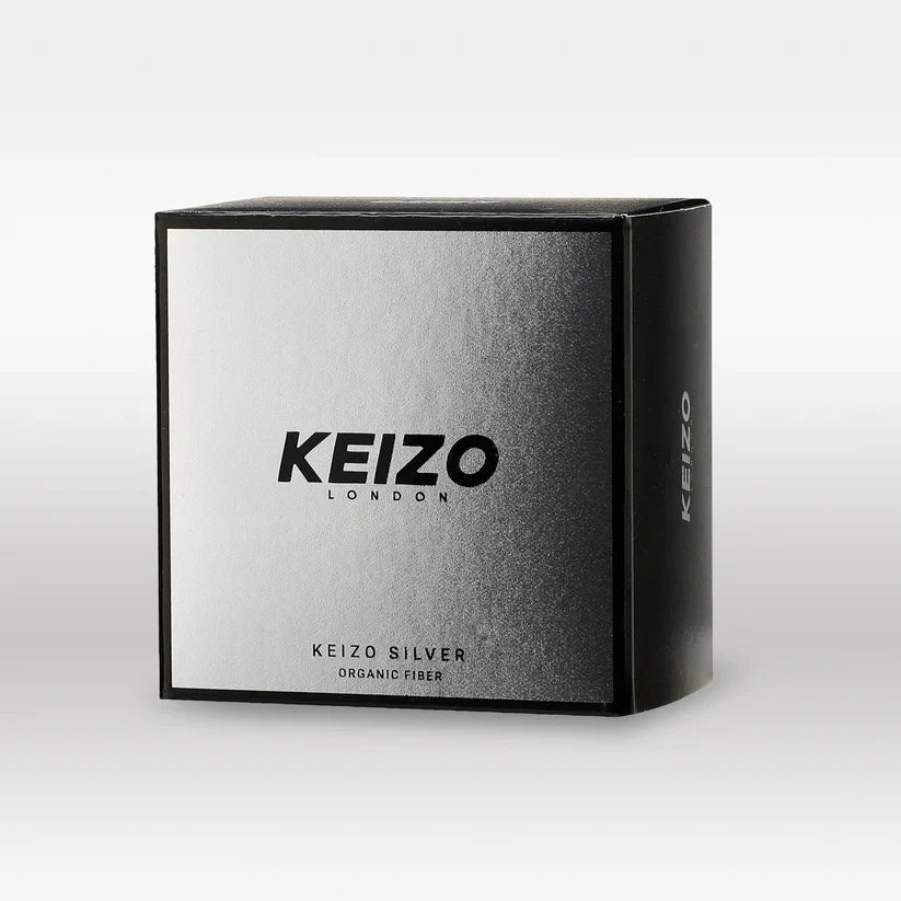 A square black and silver Keizo London Silver 40g Car Perfume box, branded Keizo, stands out on a white background, offering modern freshness for an elegant driving experience.