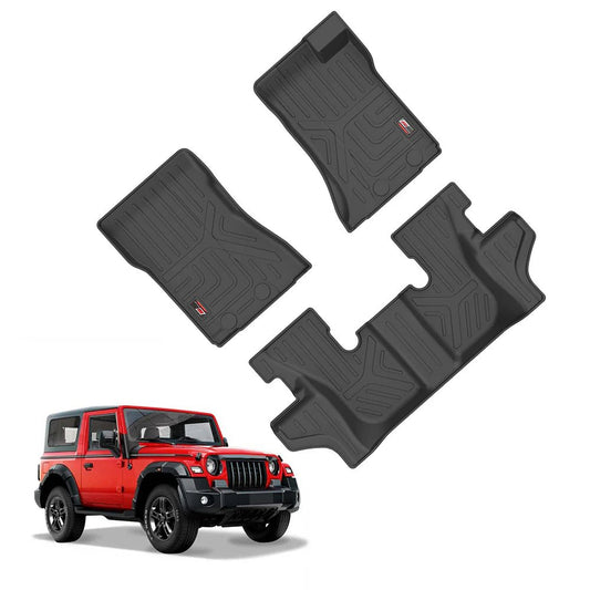 A Mahindra Thar with three black GFX Life Long Car Floor Mats shown above it on a white background for ultimate floor protection.
